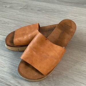 Calvin Klein tan leather wood sole platform slides
